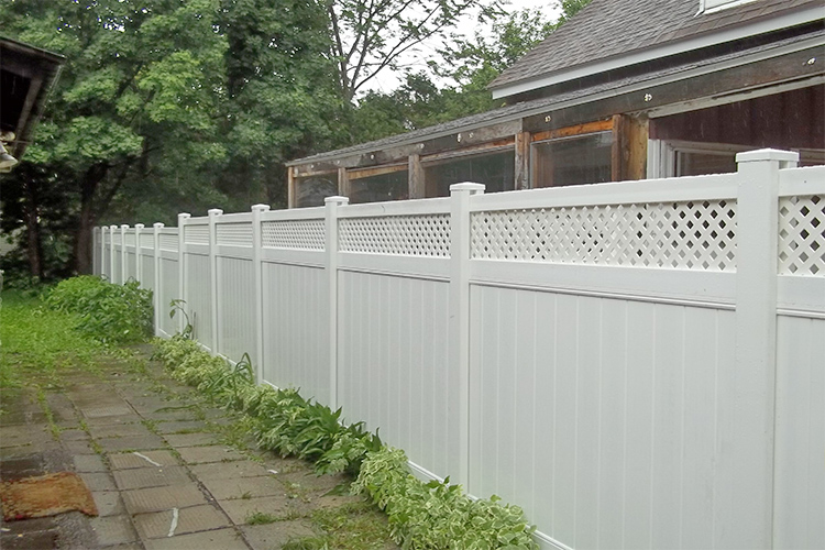 Cedar privacy fence installation by Williamsburg Woods and Garden, Ontario